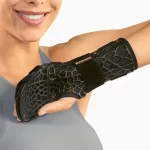 Muñequera con fijación de dedos para inmovilización